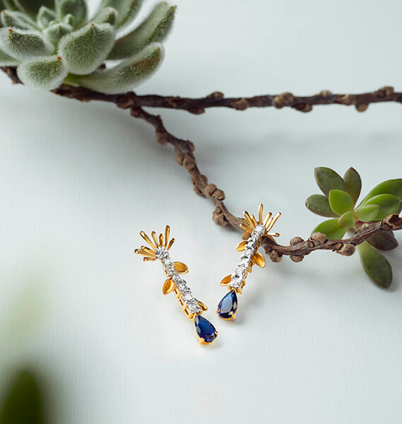 Gold Earrings with white stone