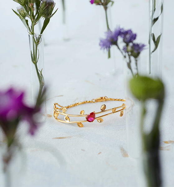 Gold Bracelet with red stone
